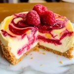 LEMON RASPBERRY SWIRL CHEESECAKE